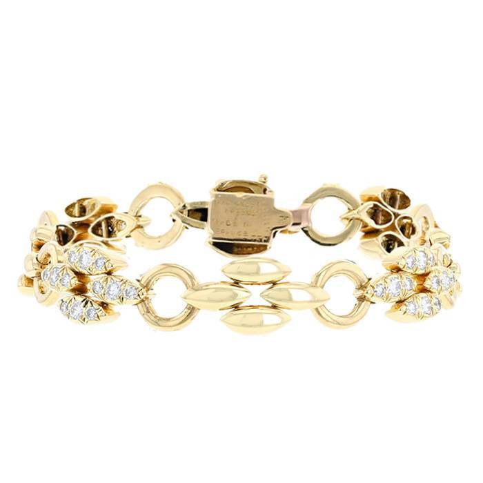 bracelet articulé van cleef & arpels en or jaune et diamants