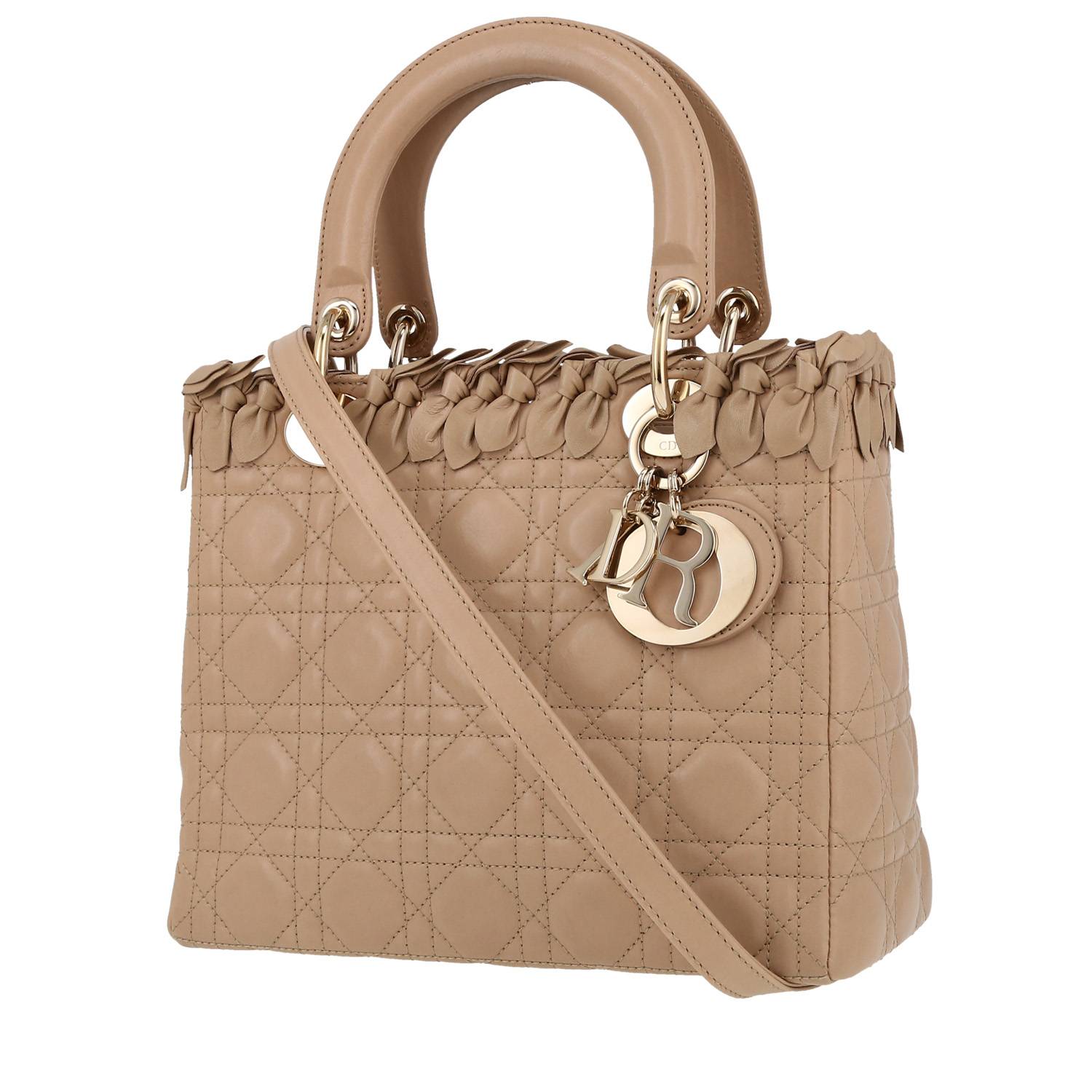 Lady Dior Handbag In Leather Cannage