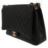 Chanel  Timeless Maxi Jumbo shoulder bag  in black quilted grained leather - Detail D3 thumbnail