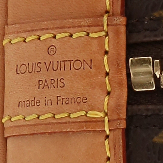 Louis Vuitton  Alma handbag  in brown monogram canvas  and natural leather - Detail D9