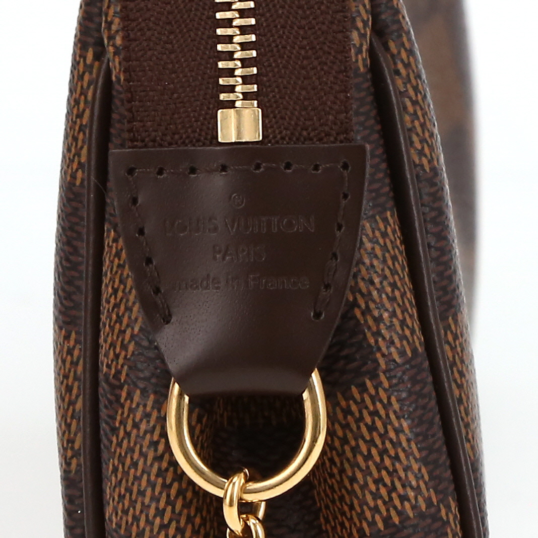 Pochette Louis Vuitton  Eva en toile damier enduite marron - Detail D2