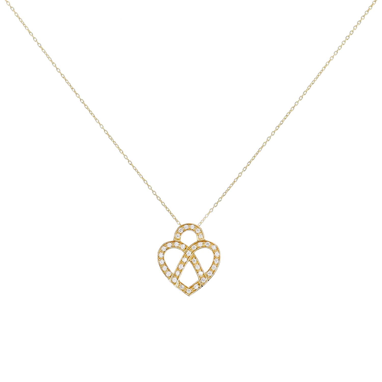 Poiray Coeur Entrelacé pendant in yellow gold and diamonds