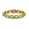 Mauboussin   1970's bracelet in yellow gold and turquoises - 00pp thumbnail