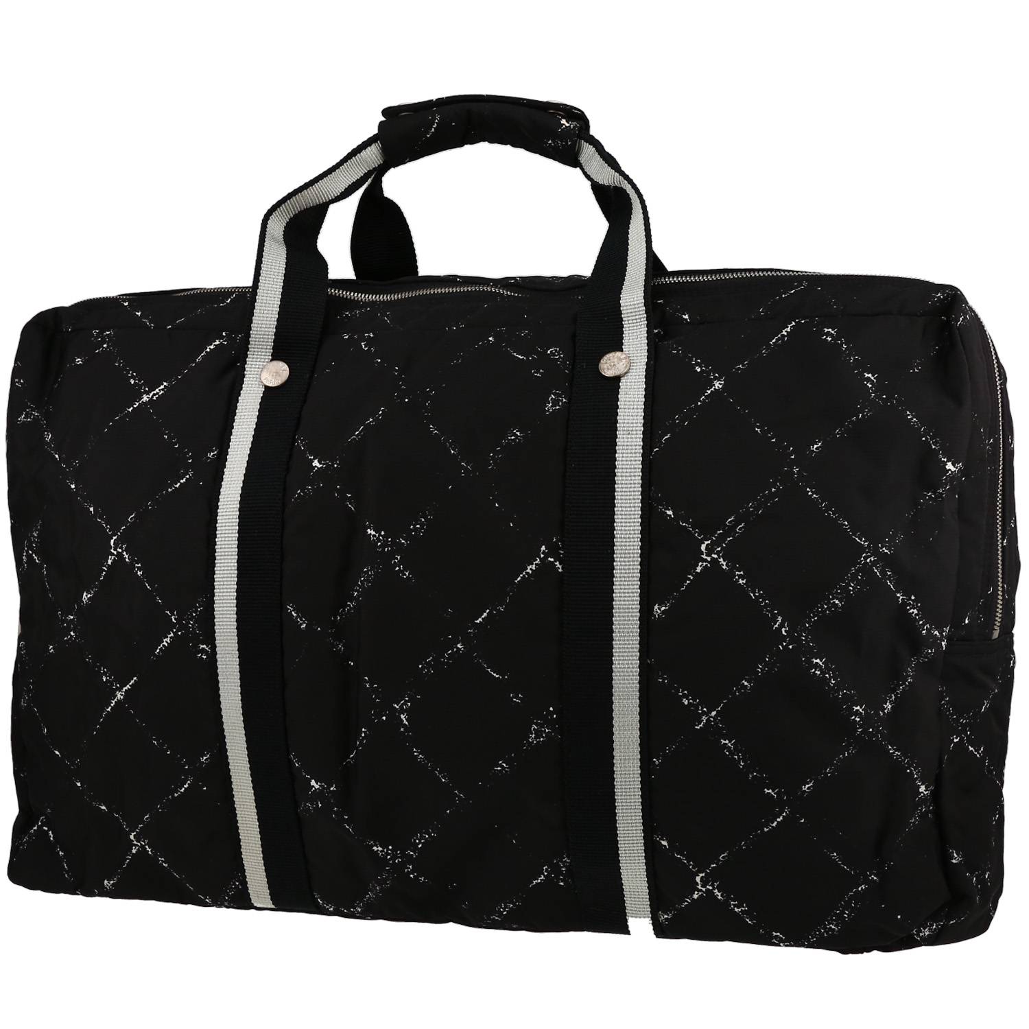 Chanel duffle bag sale black and white