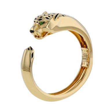 Bracelet ouvrant Cartier Panthère en or jaune, laque noir et tsavorites