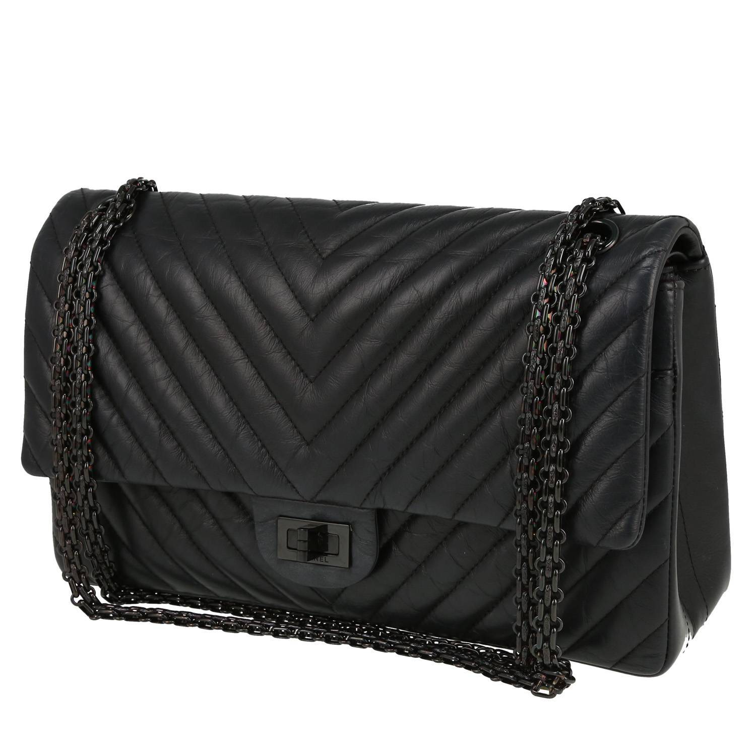 Chanel 2.55 shoulder bag in black chevron quilted leather