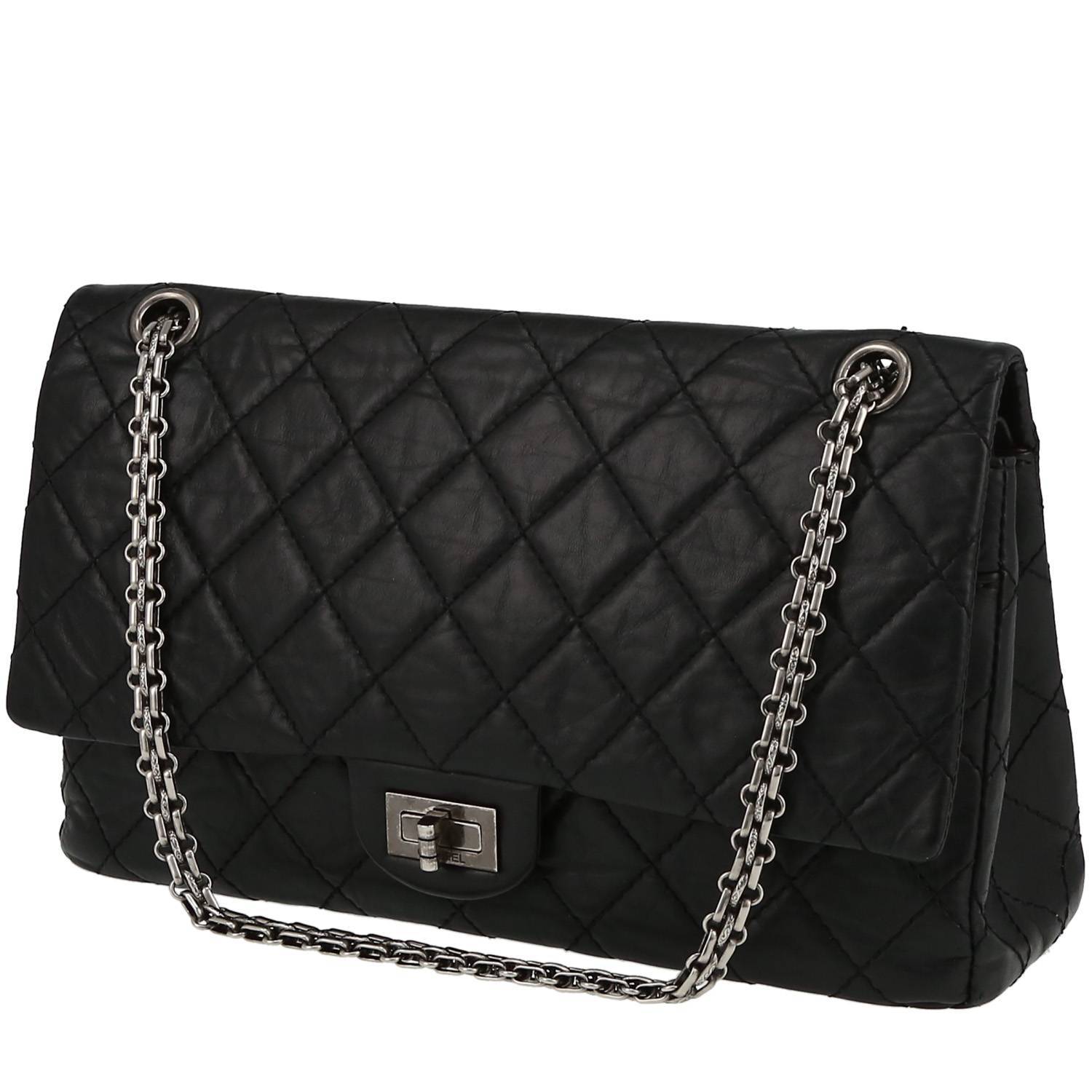 Chanel 2.55 handbag in black quilted leather