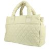 Chanel  Coco Cocoon bag worn on the shoulder or carried in the hand  in off-white quilted leather - 00pp thumbnail