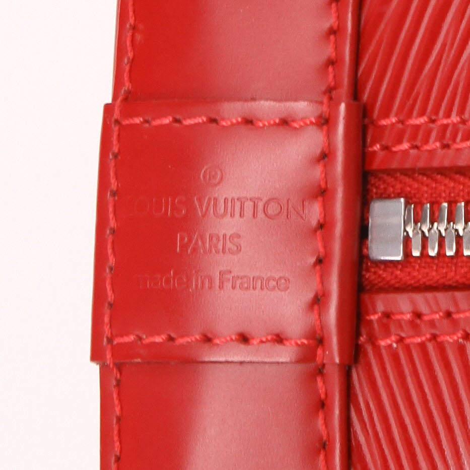 Sac à main Louis Vuitton  Alma en cuir épi rouge - Detail D2