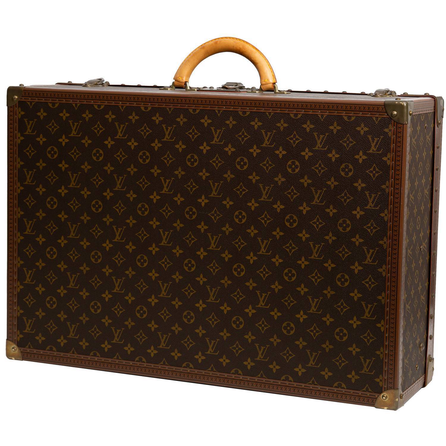 Louis Vuitton Alzer 65 suitcase monogram canvas and lozine (vulcanised fibre)