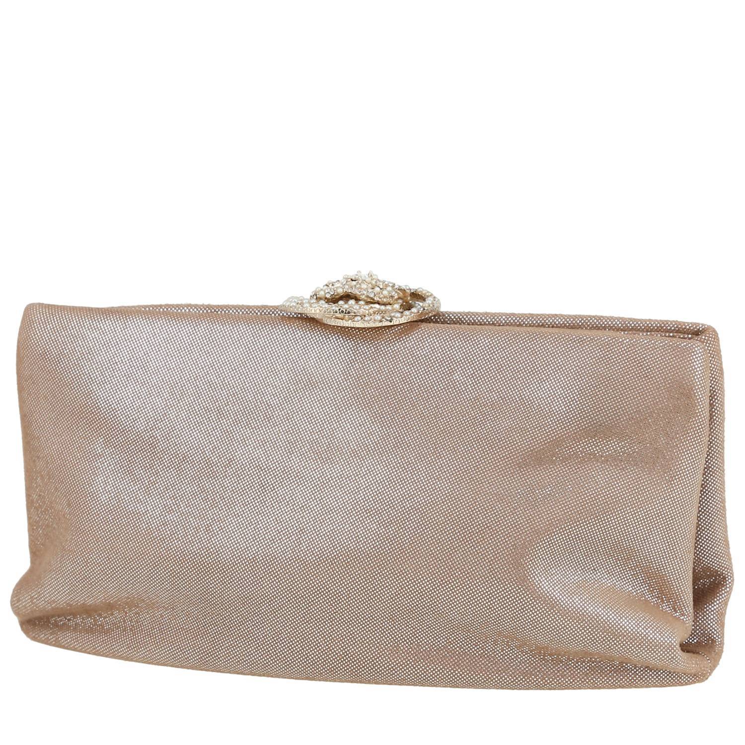 Chanel clutch in gold canvas