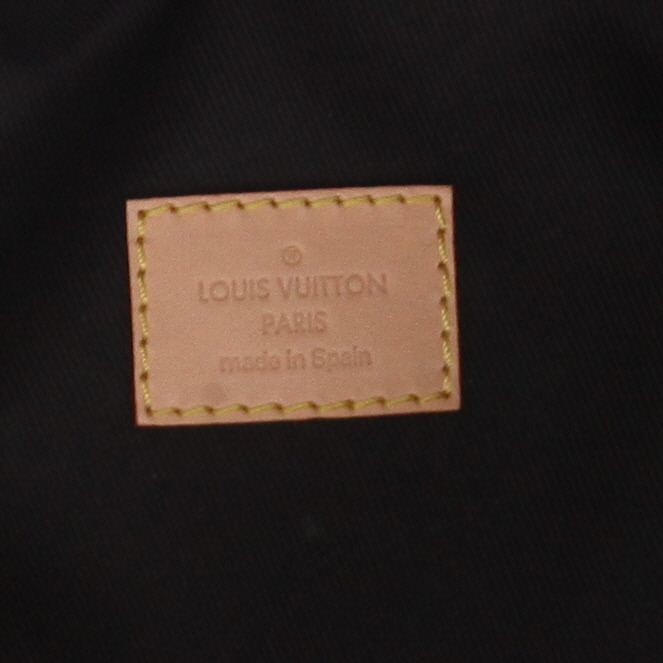 Louis Vuitton  Bumbag clutch-belt  in brown monogram canvas  and natural leather - Detail D2