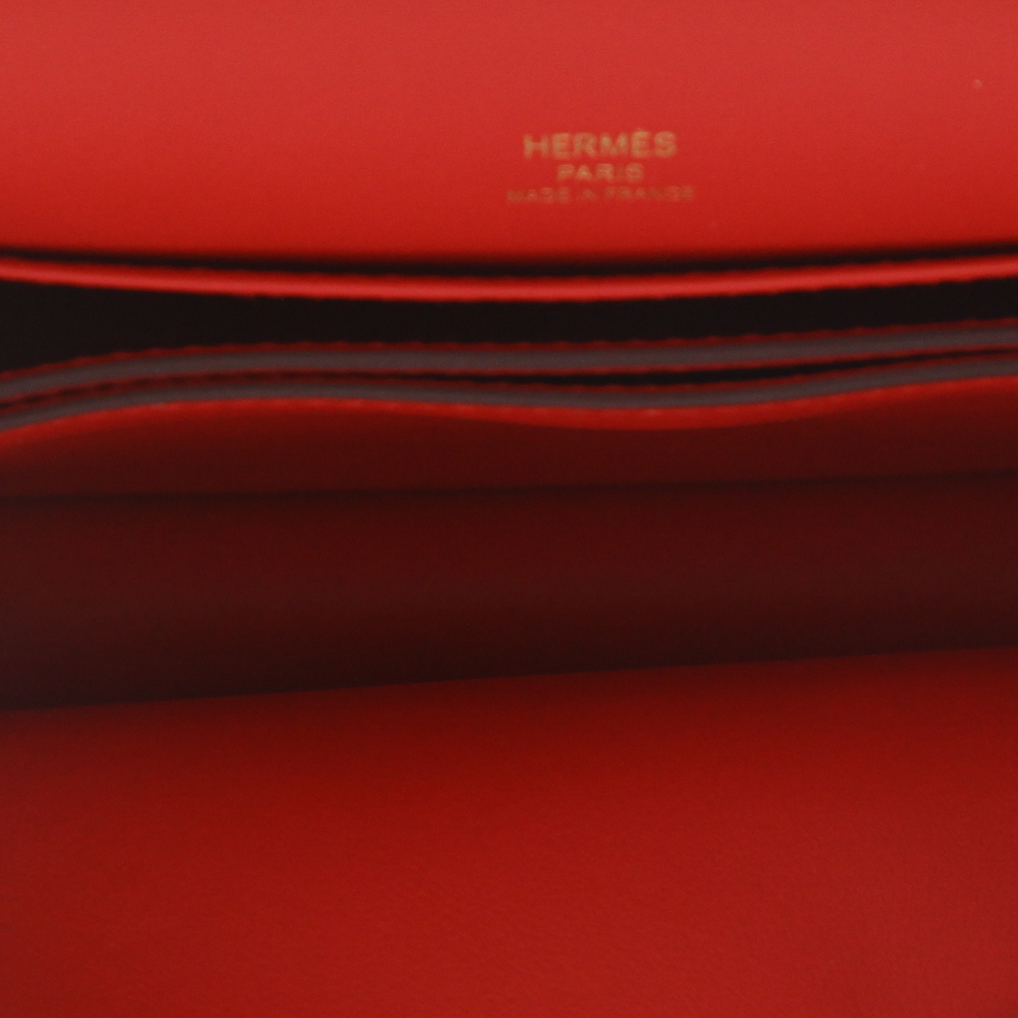 Bolso bandolera Hermès  Roulis en cuero swift rojo y azul - Detail D3