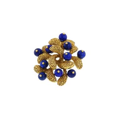Broche Van Cleef 
Arpels Gui de oro amarillo y lapislázuli