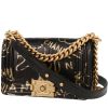 Chanel  Boy small model  shoulder bag  in black and gold quilted leather - 00pp thumbnail
