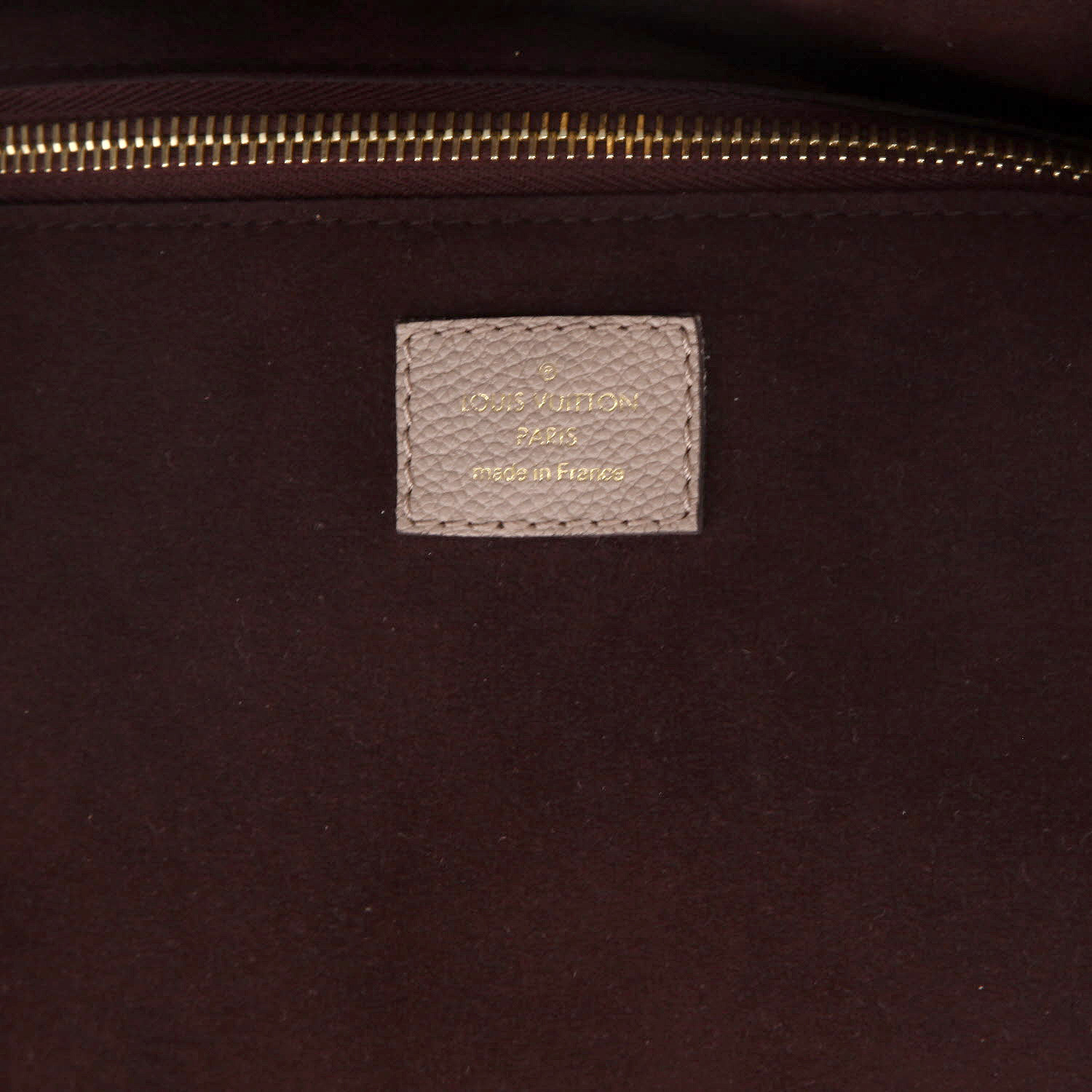 Louis Vuitton  Neverfull shopping bag  in beige empreinte monogram leather - Detail D2