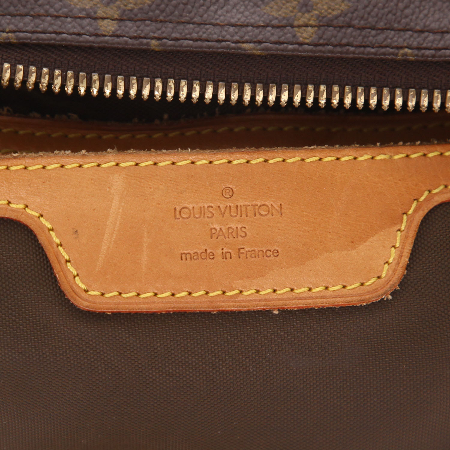 Louis Vuitton  Evasion travel bag  in brown monogram canvas  and natural leather - Detail D2