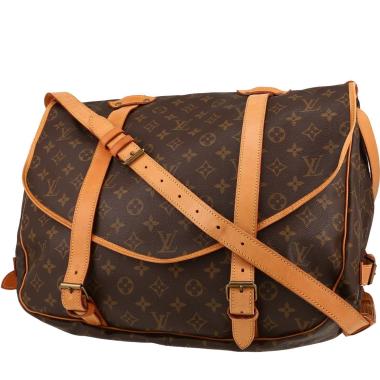 Louis Vuitton  Saumur medium model  shoulder bag  in brown monogram canvas  and natural leather