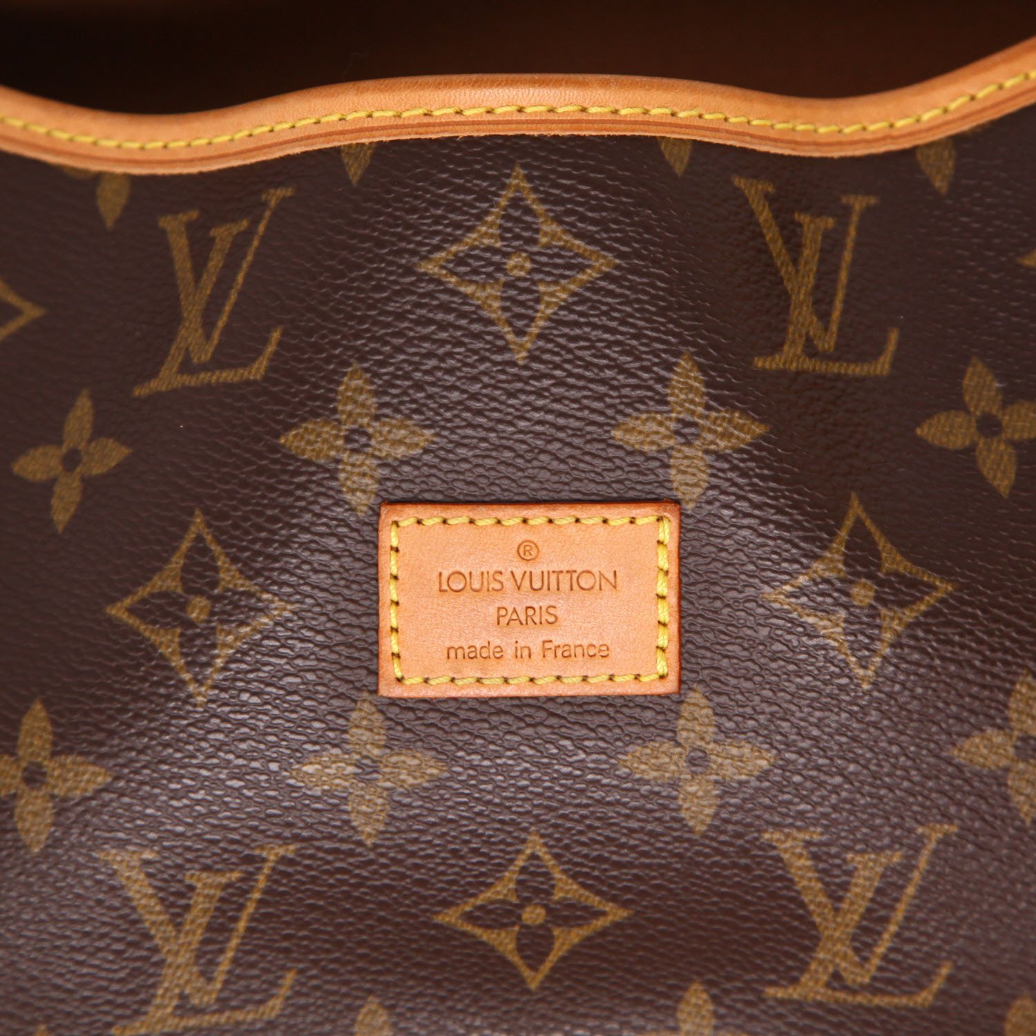 Sac bandoulière Louis Vuitton  Saumur moyen modèle  en toile monogram enduite marron et cuir naturel - Detail D2