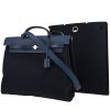 Bolso para llevar al hombro o en la mano Hermès  Herbag en lona azul marino y cuero azul - 00pp thumbnail