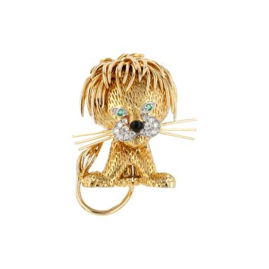 Broche época años 60 Van Cleef 
Arpels Lion Ebouriffé modelo grande de oro amarillo, diamantes y esmeralda