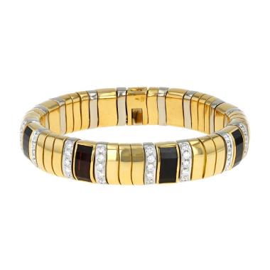 Bracelet Pomellato Tubolare en or jaune, grenats et diamants