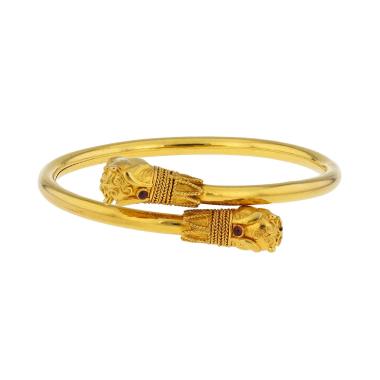 Brazalete semirrígido Lalaounis Animal Head de oro amarillo y rubíes