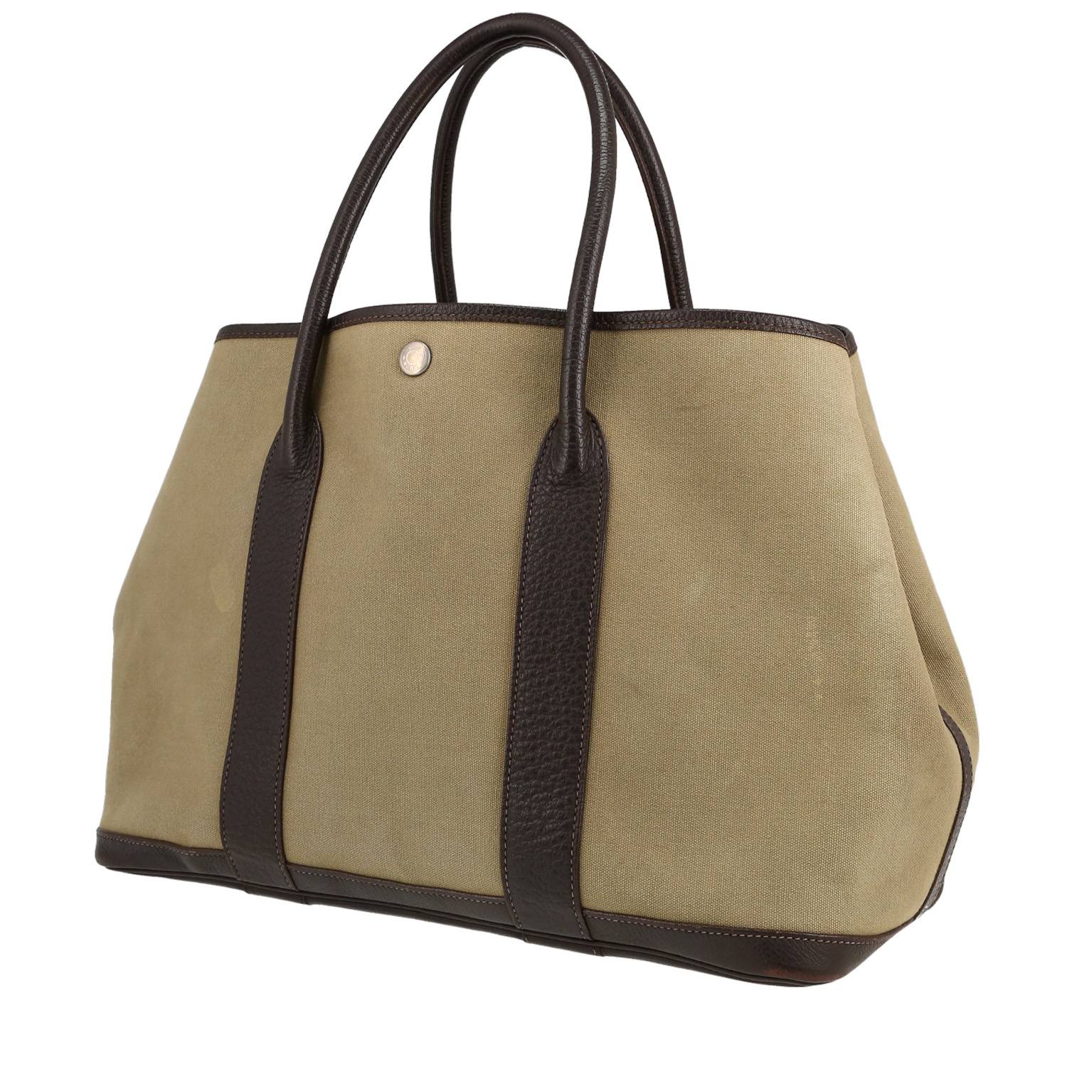 Sac cabas Hermès  Garden en toile vert-kaki et cuir marron