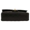 Chanel  Timeless Petit shoulder bag  in black quilted leather - Detail D1 thumbnail