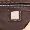 Bolso de mano Fendi  Baguette en lona monogram beige y cuero marrón - Detail D2 thumbnail