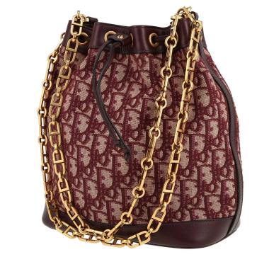 Bolso de mano Dior  Bucket en lona Monogram Oblique color burdeos y cuero color burdeos