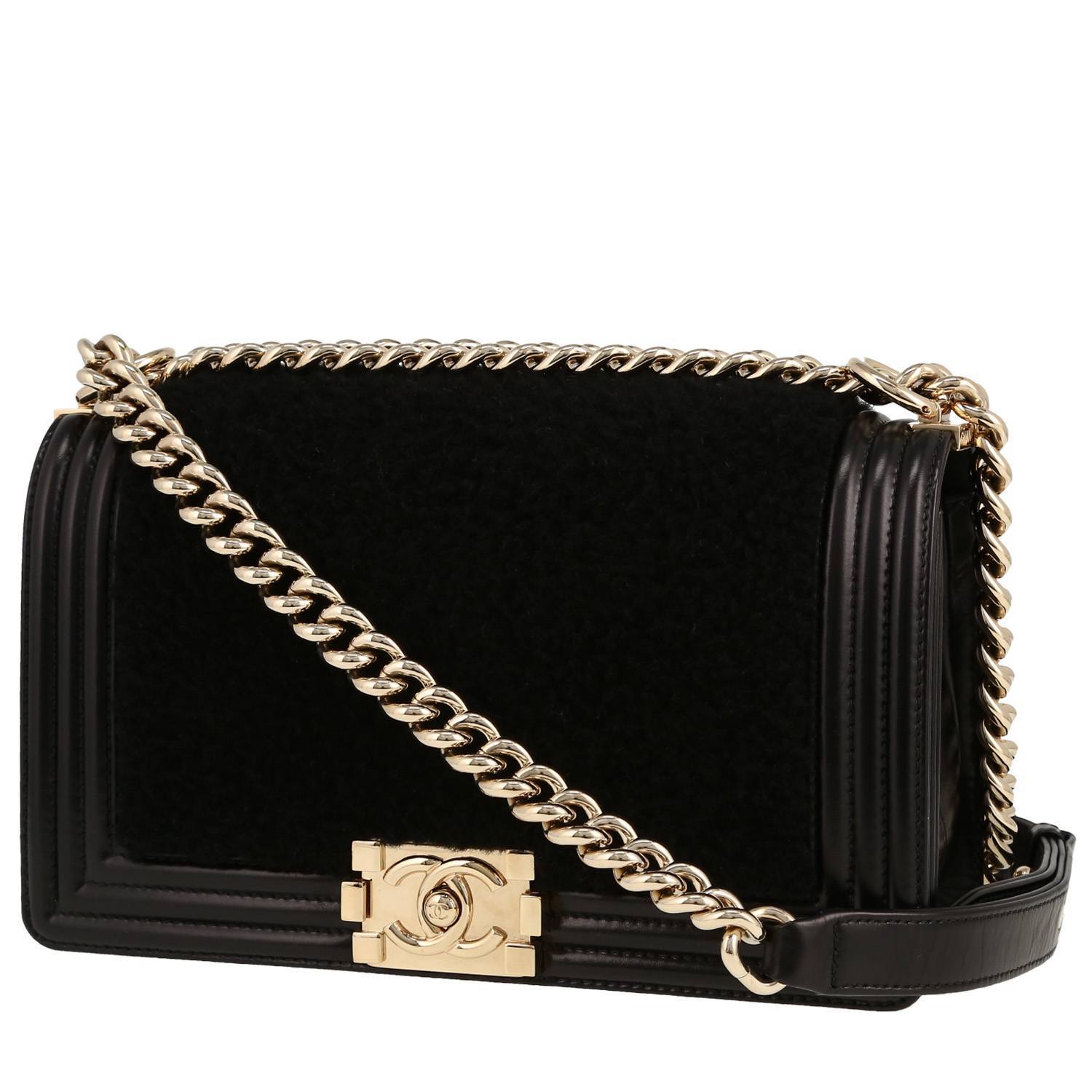 Chanel Boy shoulder bag in black furr and leather