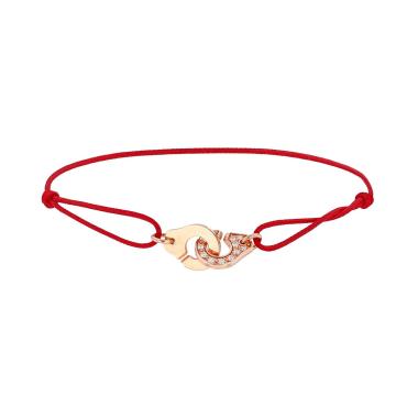 Brazalete Dinh Van Menottes R8 de oro amarillo y nylon