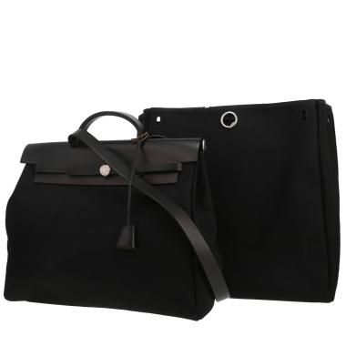 Hermès  Herbag bag worn on the shoulder or carried in the hand  in black canvas  and black leather