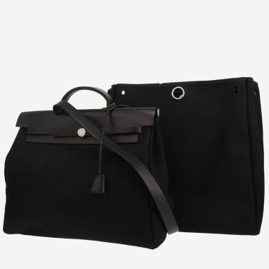 Hermès  Herbag bag worn on the shoulder or carried in the hand  in black canvas  and black leather