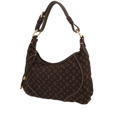 Louis Vuitton  Manon bag worn on the shoulder or carried in the hand  in brown monogram canvas Idylle
