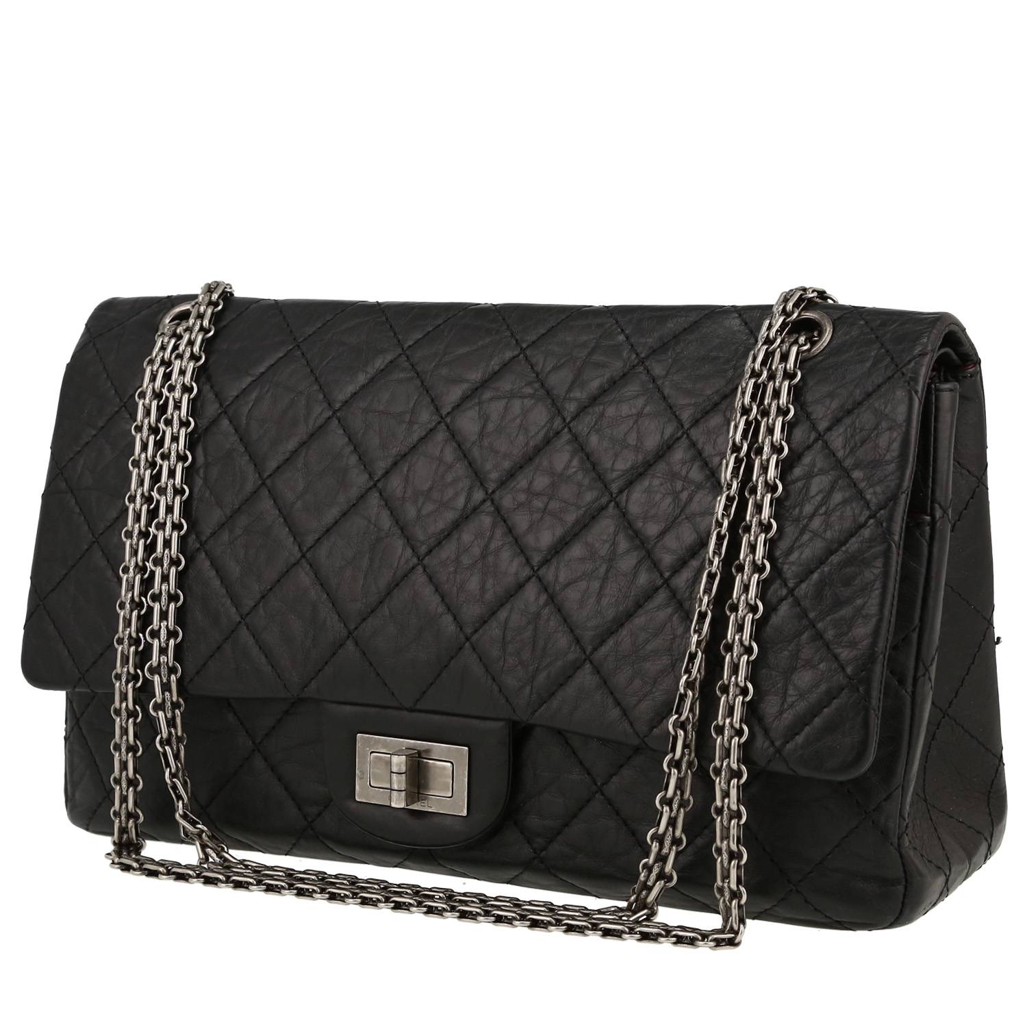 Chanel 2.55 handbag in black quilted leather