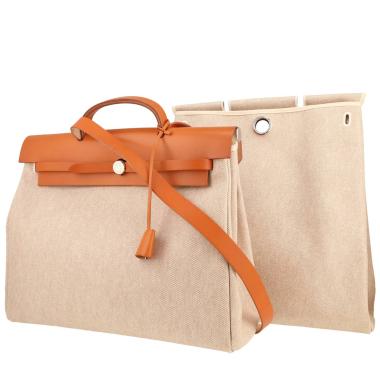 Bolso para llevar al hombro o en la mano Hermès  Herbag en lona beige y cuero natural