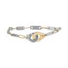 Dinh Van Menottes R12 bracelet in yellow gold and stainless steel - 00pp thumbnail