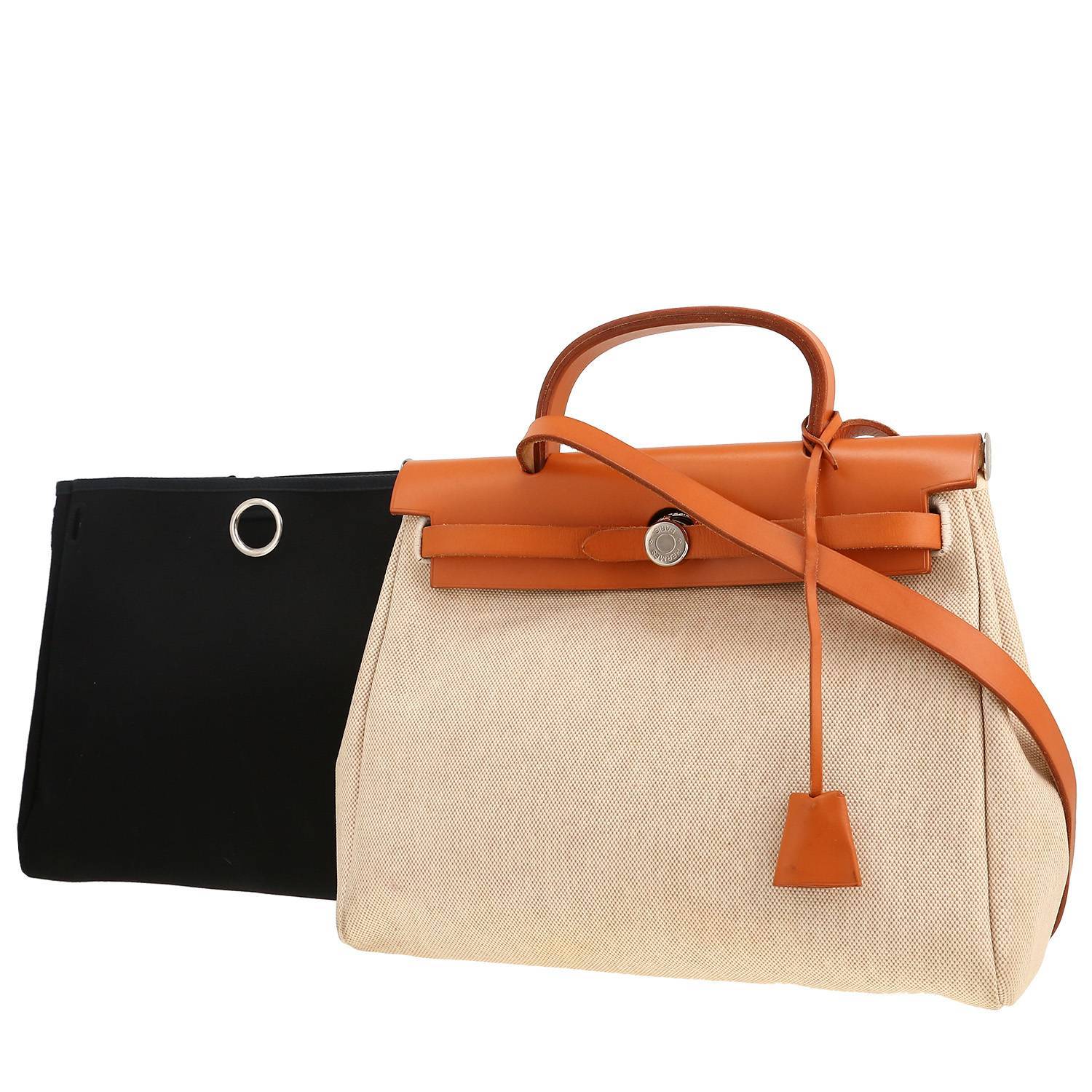 Bolso para llevar al hombro o en la mano Hermès  Herbag en lona beige y vaca Hunter