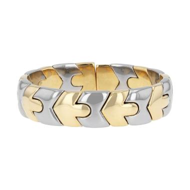 Hald-rigid Bulgari  bracelet in yellow gold and stainless steel
