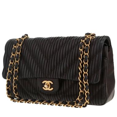 Chanel  Timeless Classic medium model  handbag  in black chevron quilted leather
