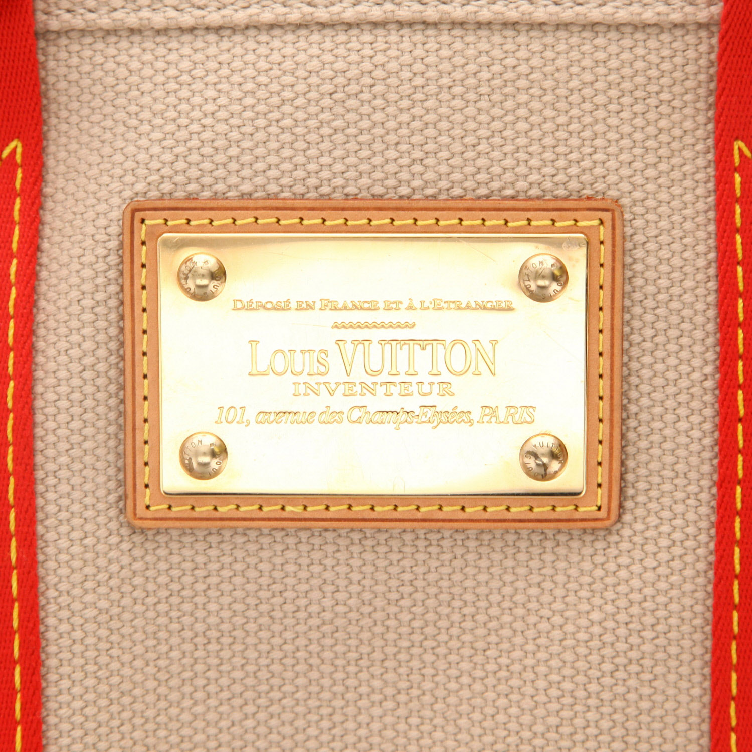 Sac à main Louis Vuitton  Antigua petit modèle  en toile beige et rouge - Detail D2