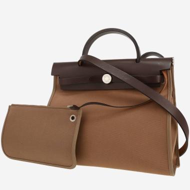 Hermès  Herbag bag worn on the shoulder or carried in the hand  in brown canvas  and brown leather