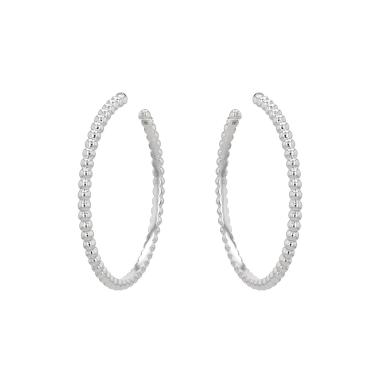 Par de criollas Van Cleef 
Arpels Perlée de oro blanco