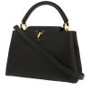 Bolso de mano Louis Vuitton  Capucines MM en cuero taurillon clémence negro y junco rosa - 00pp thumbnail