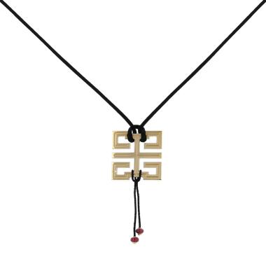 Cartier Le Baiser du Dragon pendant in yellow gold and ruby