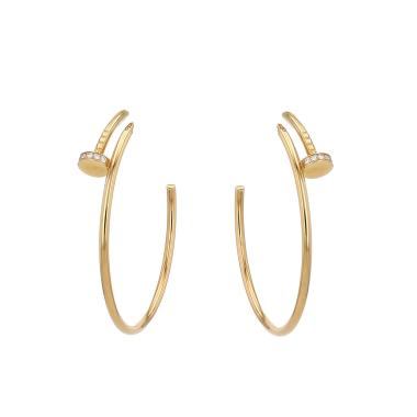 Paire de créoles Cartier Juste un clou grand modèle en or jaune et diamants