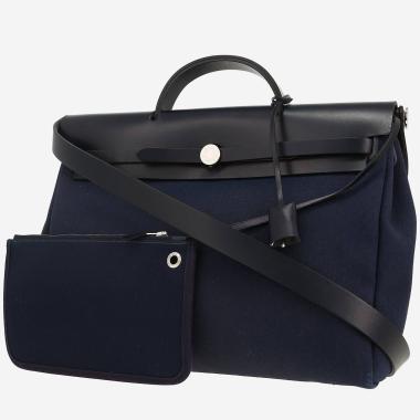 Hermès  Herbag bag worn on the shoulder or carried in the hand  in blue canvas  and blue leather
