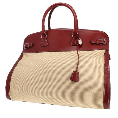 Hermès   travel bag  in red H box leather  and beige hair